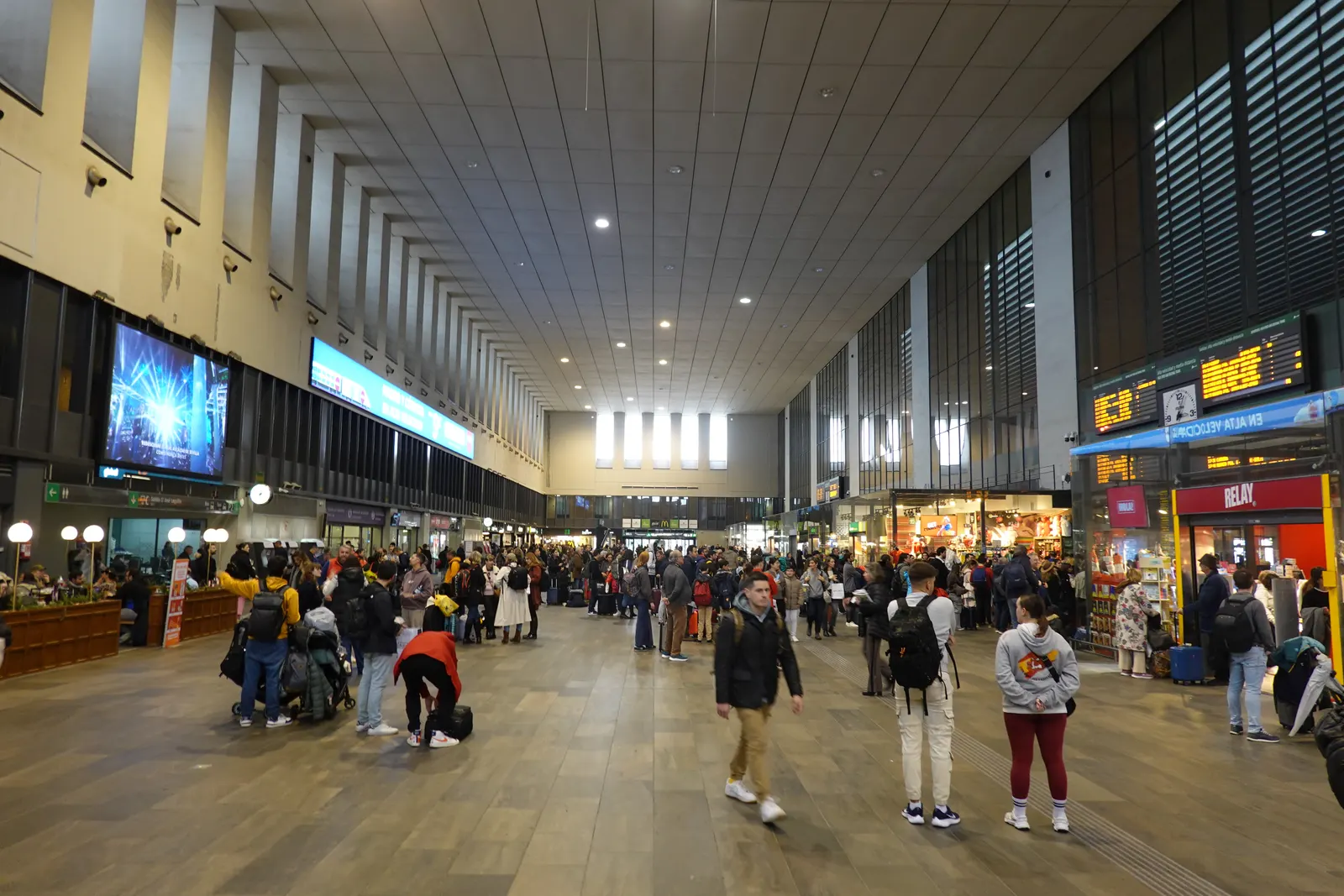 The bright main concourse of Seville's Santa Justa railway station